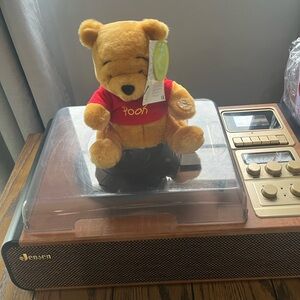 Winnie the Pooh plays song and moves!Charming Yellow and Red Stuffed Bear